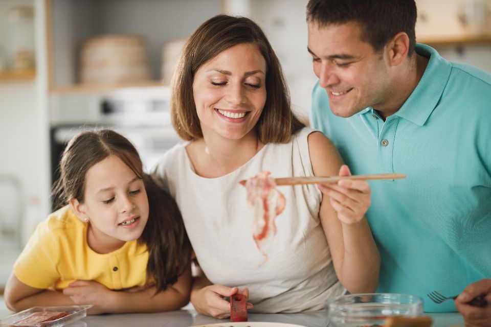 A family cooking together in their kitchen